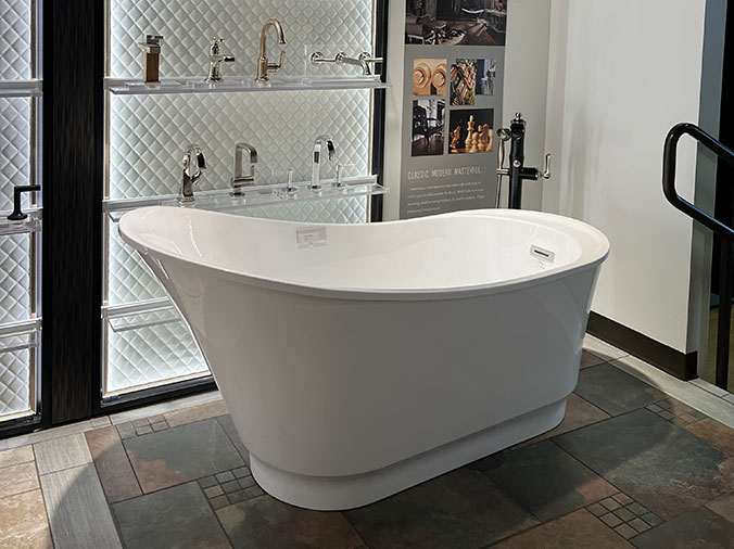 McDonald Plumning Supply showroom interior showing a free standing bathtub