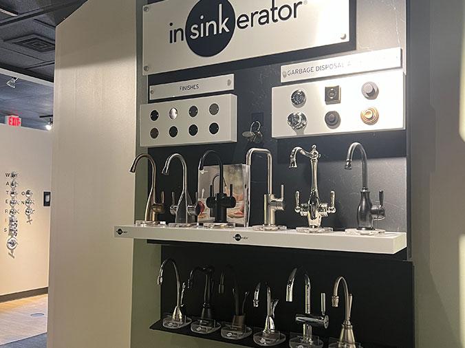 McDonald Plumning Supply showroom interior kitchen gooseneck insinkerator faucets