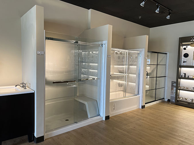 McDonald Plumning Supply showroom interior glass bathroom shower