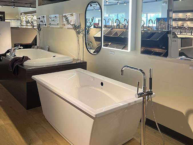 McDonald Plumning Supply showroom interior free standing bathtubs