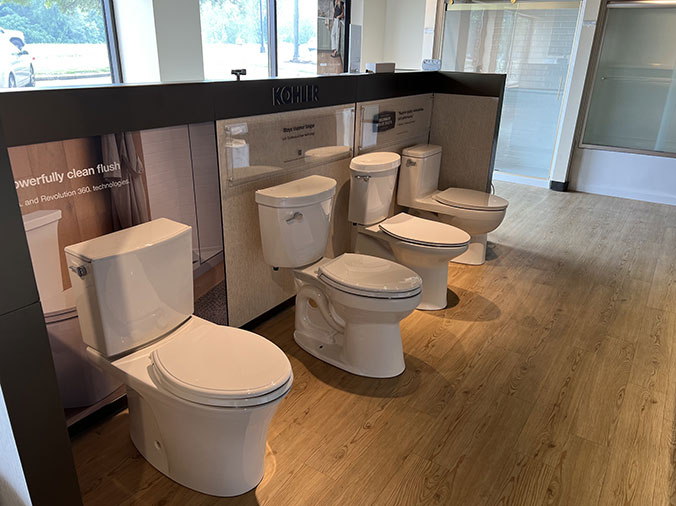 McDonald Plumning Supply showroom interior various toilets